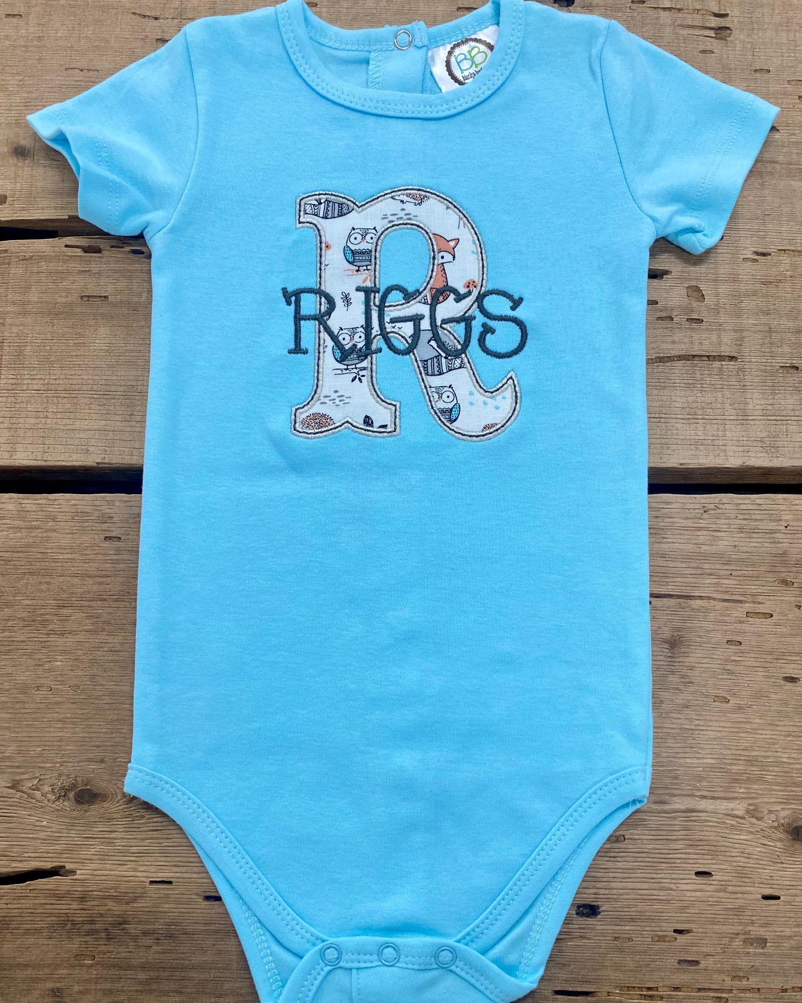 Riggs Onesie