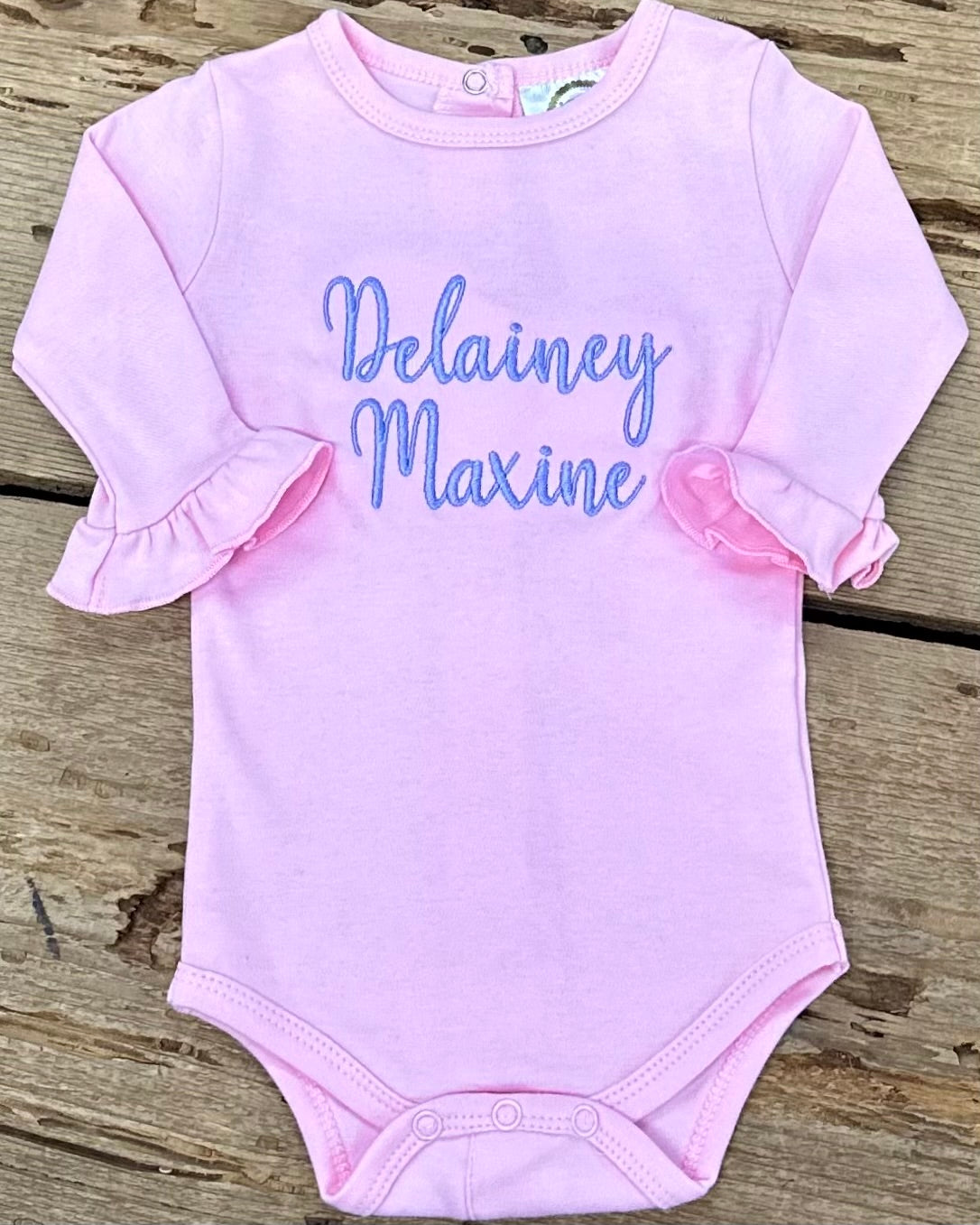 Delainey Maxine Long Sleeve Onesie