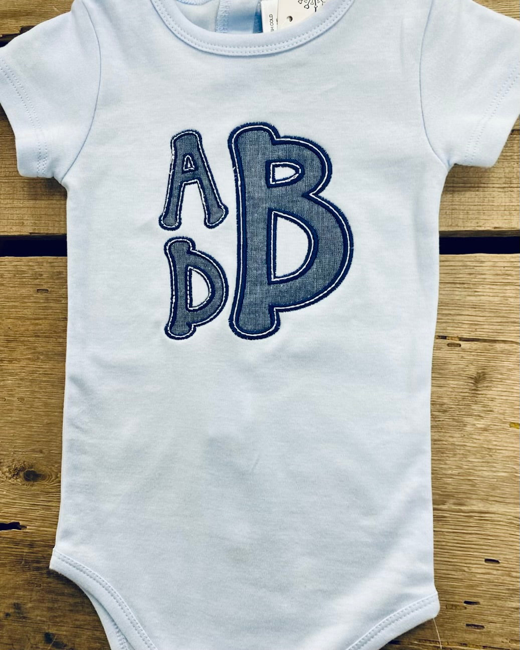 Monogram Onesie