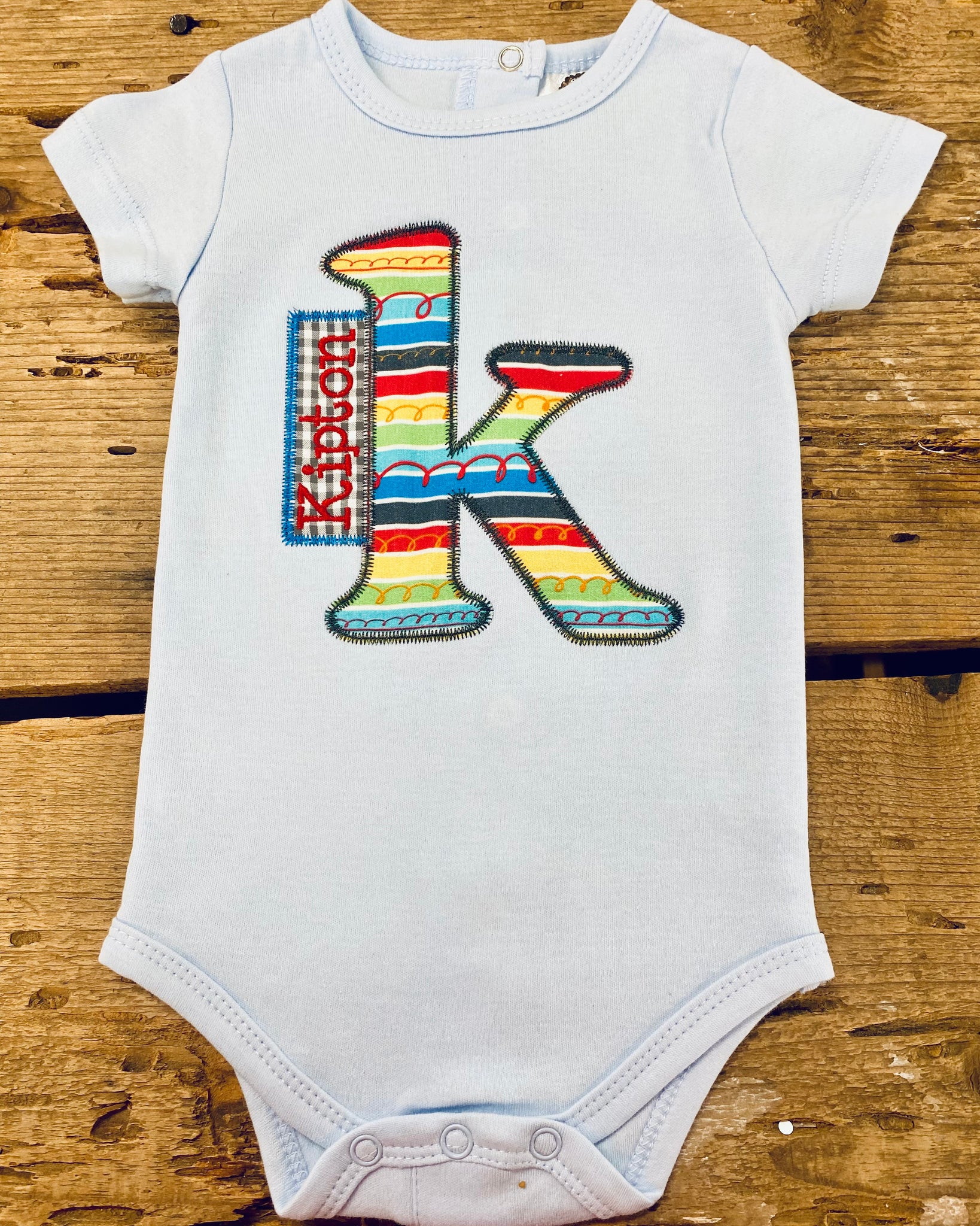 Kipton Onesie